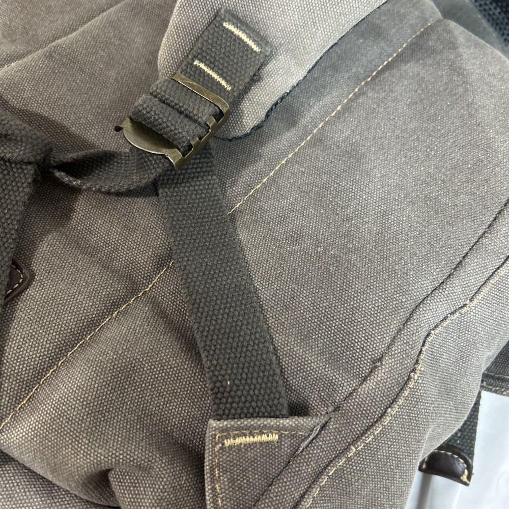 Cargoit Gray Canvas Backpack Magnetic Closures Pockets Straps and A Deep Inside