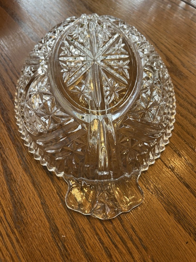 Clear glass oval serving tray with starburst pattern