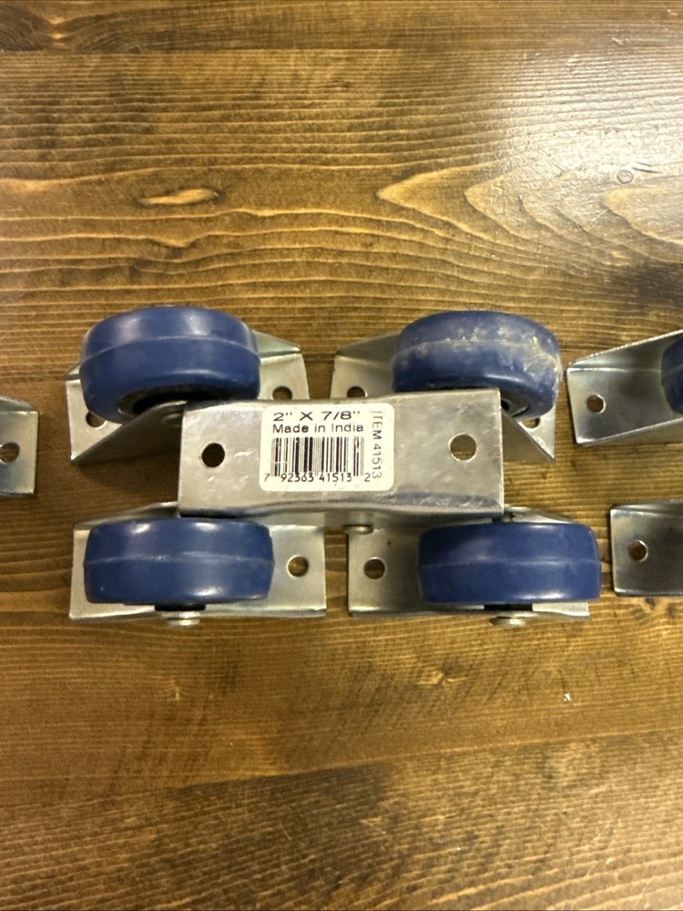 8- 2 7/8 Fixed Blue Casters Pre-owned