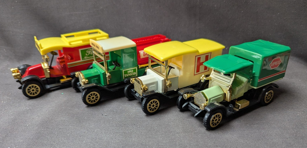 4 Die Cast Vans -
