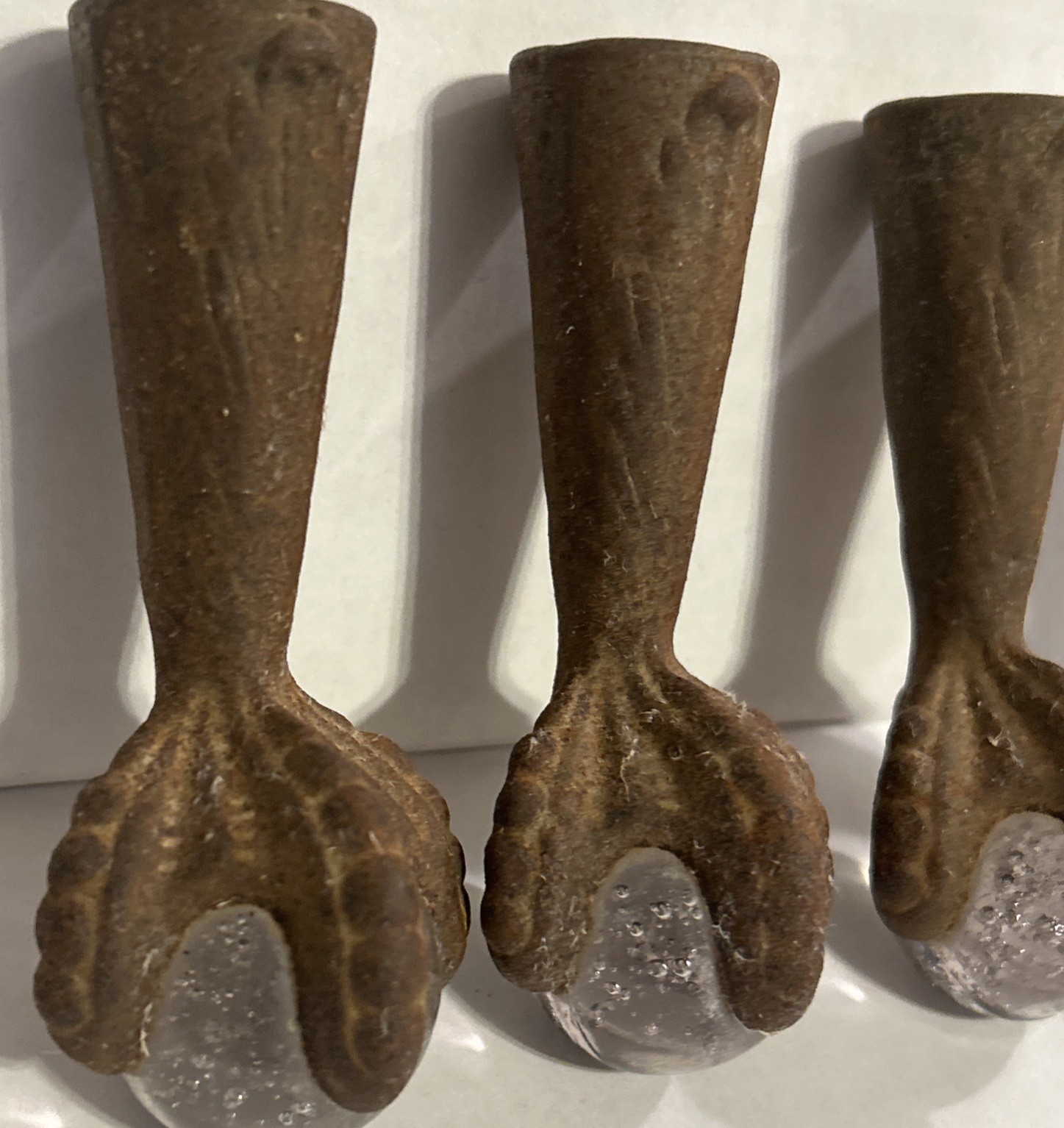 Set of 4 Vintage Art Deco Cast Iron Glass Claws and Ball Furniture Feet Casters