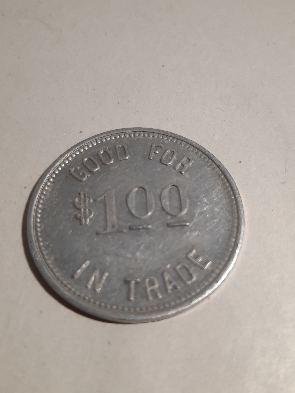 $1.00 Token: Spuds Turpentine Company, Spuds, Florida, 35mm Aluminum