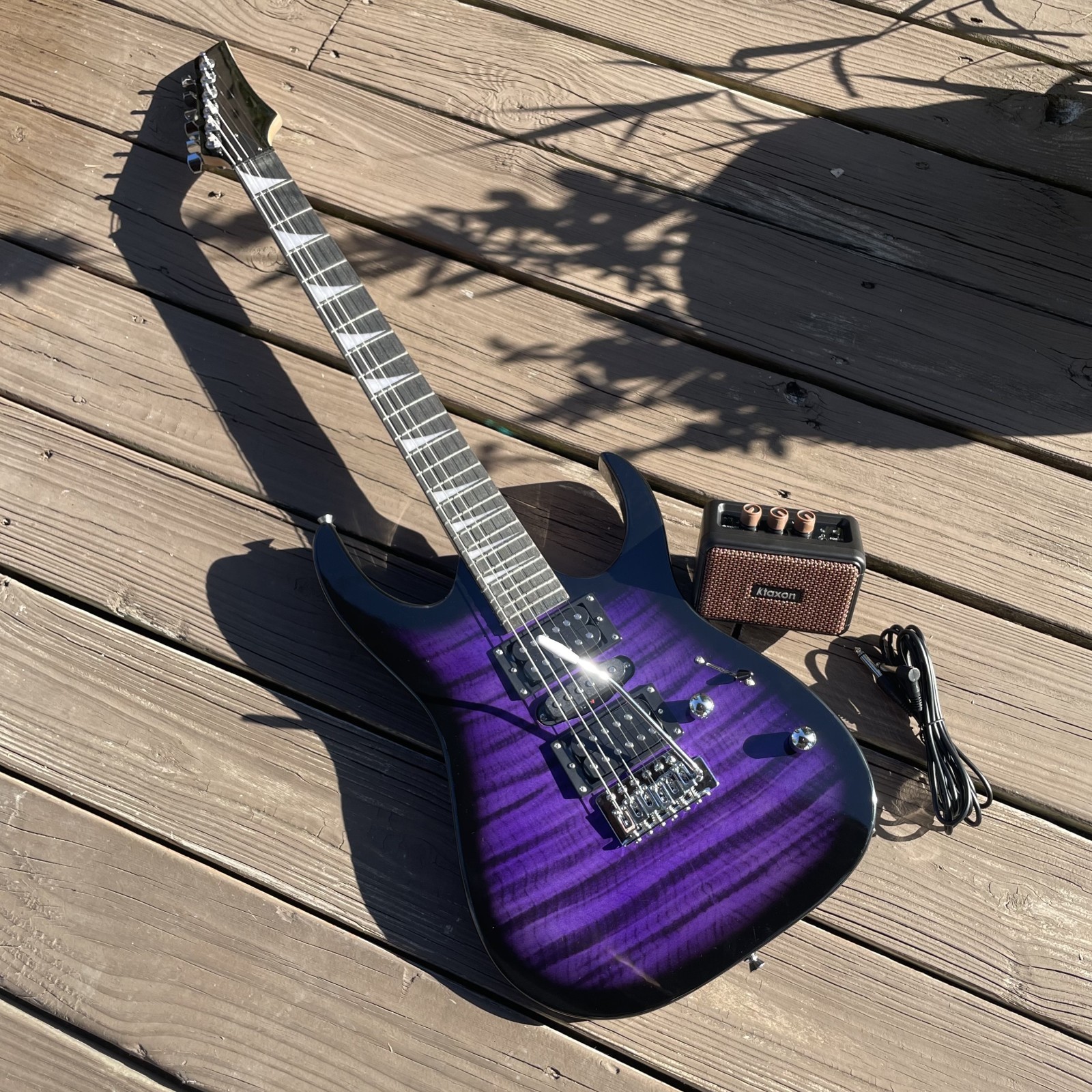Full-Size Purple Electric Guitar and 5-Watt Amp Starter Package with Accessories