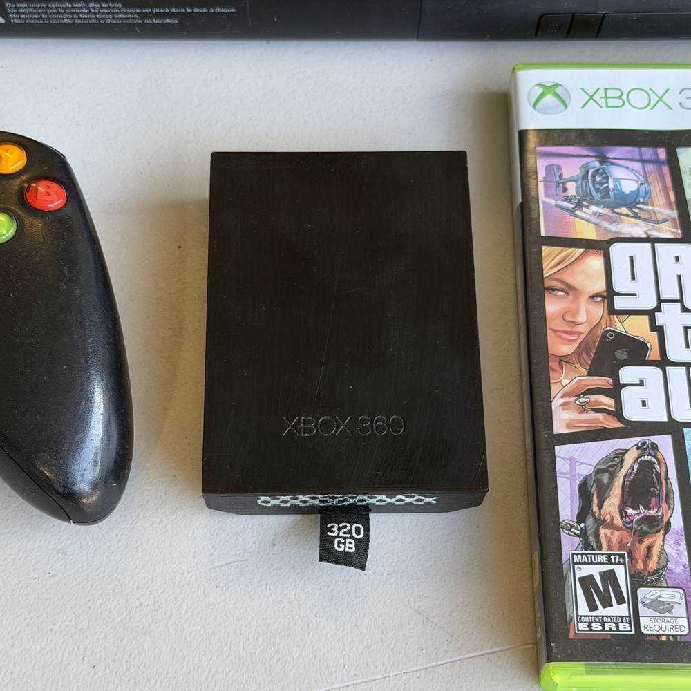 Microsoft Xbox 360 E Console 320GB W/ Controller, Cords + Grand Theft Auto V