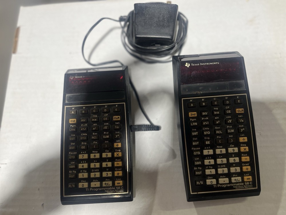 2 Programmable TI-58C calculators. Survey Program Label Card and Master.