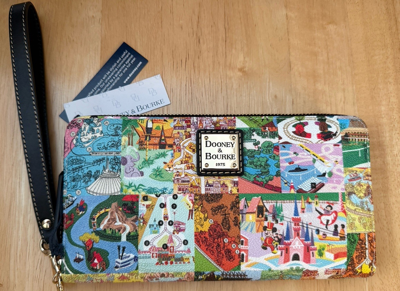 2026 Disney Parks Dooney & Bourke Park Maps Wristlet Wallet w/ Strap Brand New!