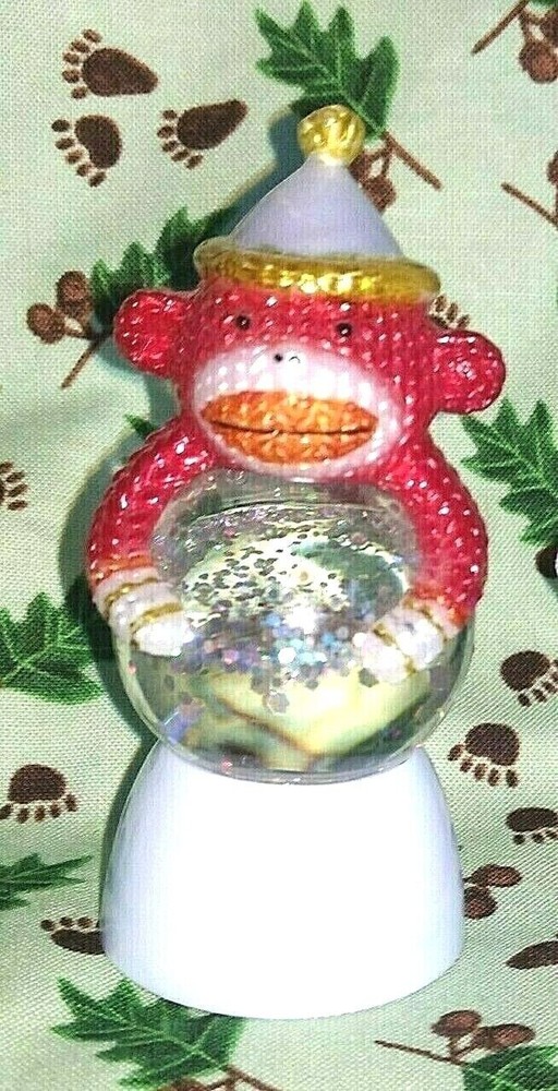 SMALL SOCK MONKEY SNOWGLOBE