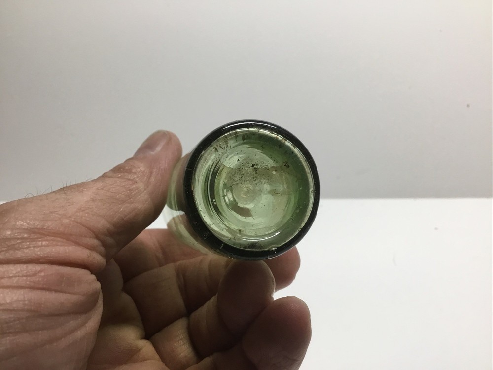 Antique Push Up Base Sample Size Wine Bottle.