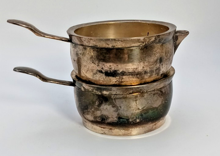 Silver plated stackable creamer and sugar set .