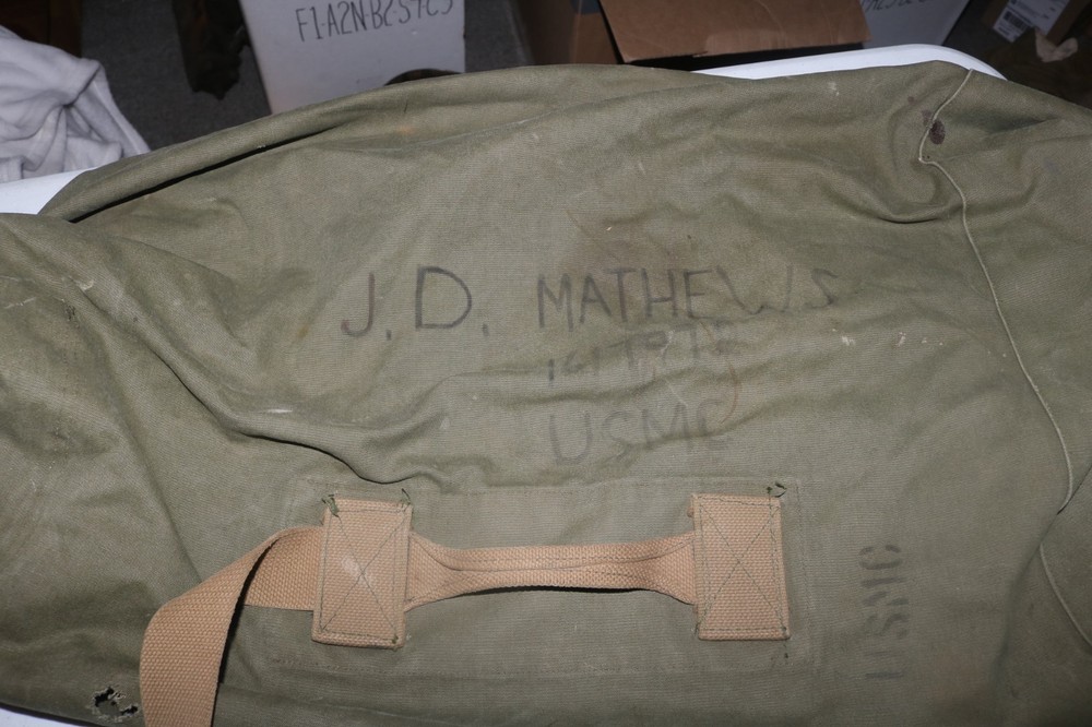 Original late WWII USMC marked transitional colored duffel bag named