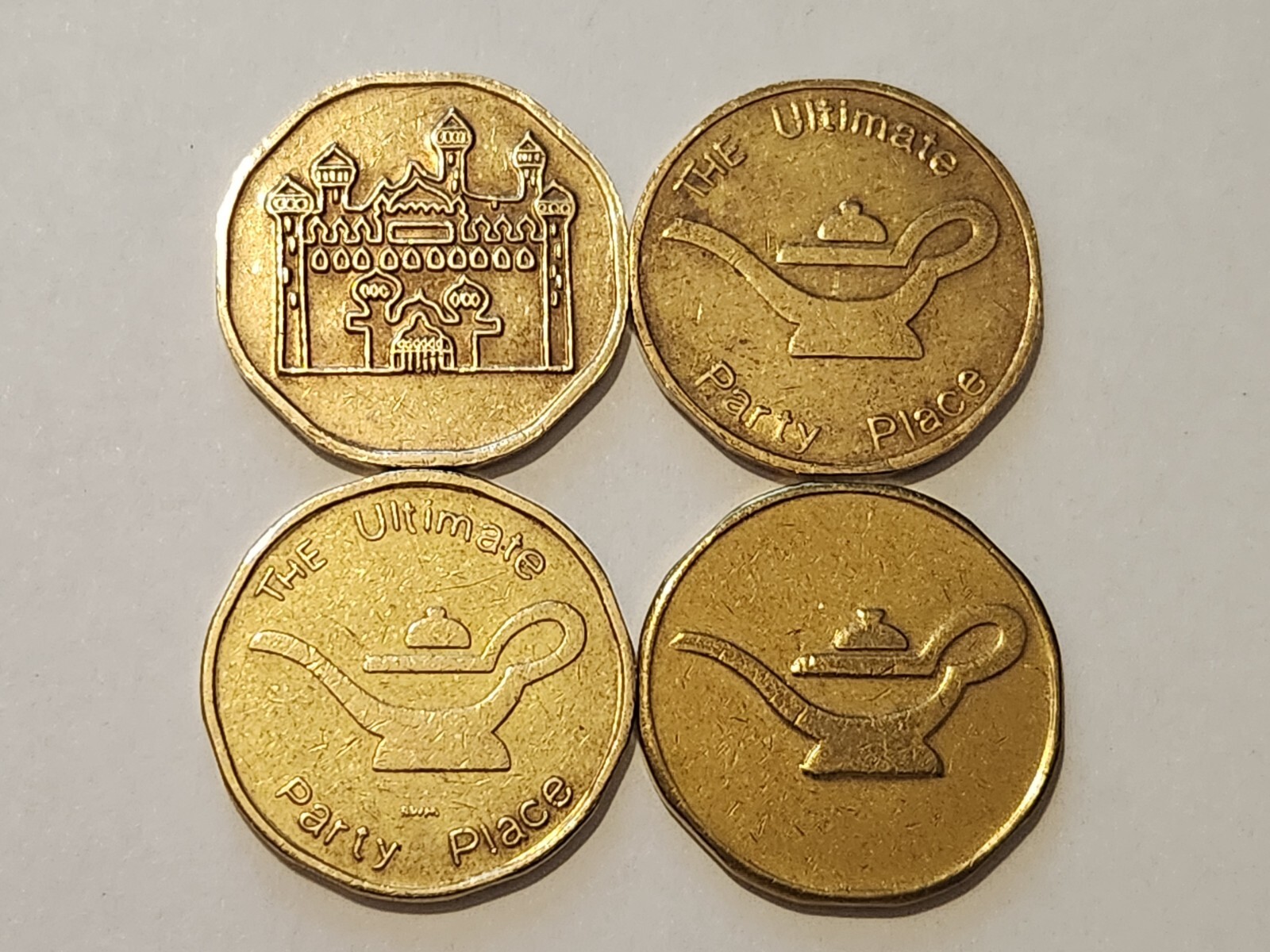 ALADDIN'S CASTLE - 4 DIFFERENT ARCADE TOKENS - GENIE/CASTLE, ALADDIN'S LAMP