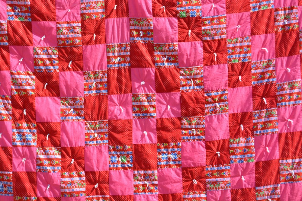 Homemade pink/red tied method patchwork quilt 57x82"