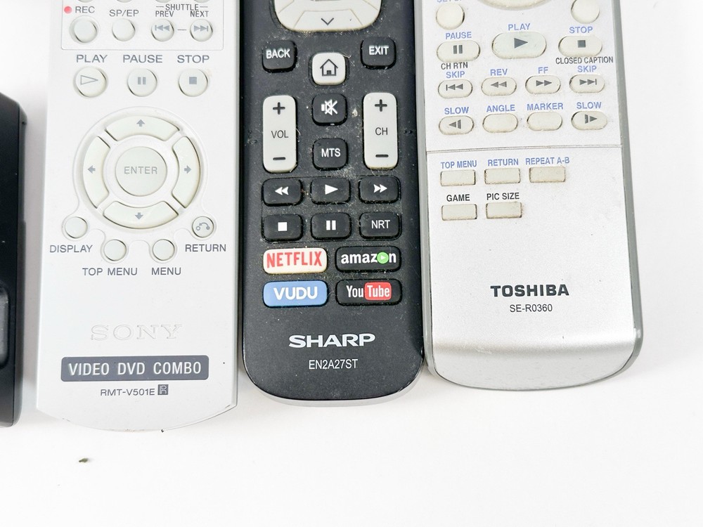 Mixed Electronics Lot TV Remotes Camera Calculators Vintage