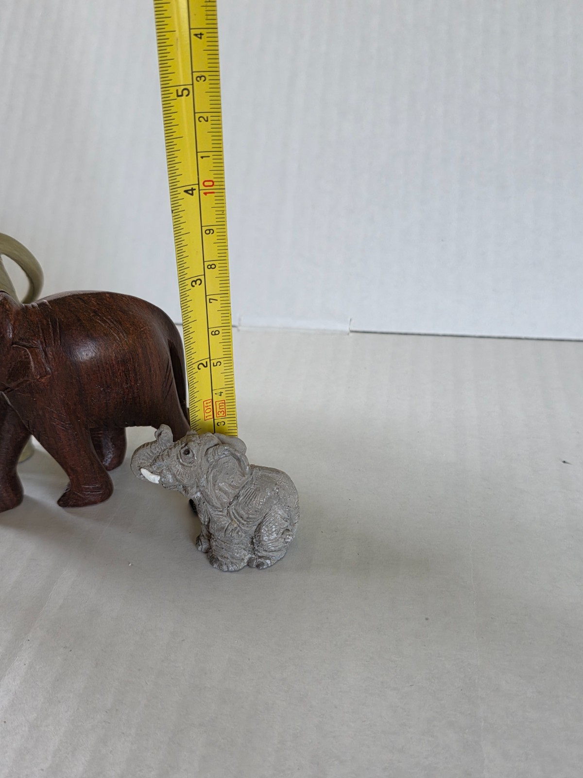 Three elephant figurines