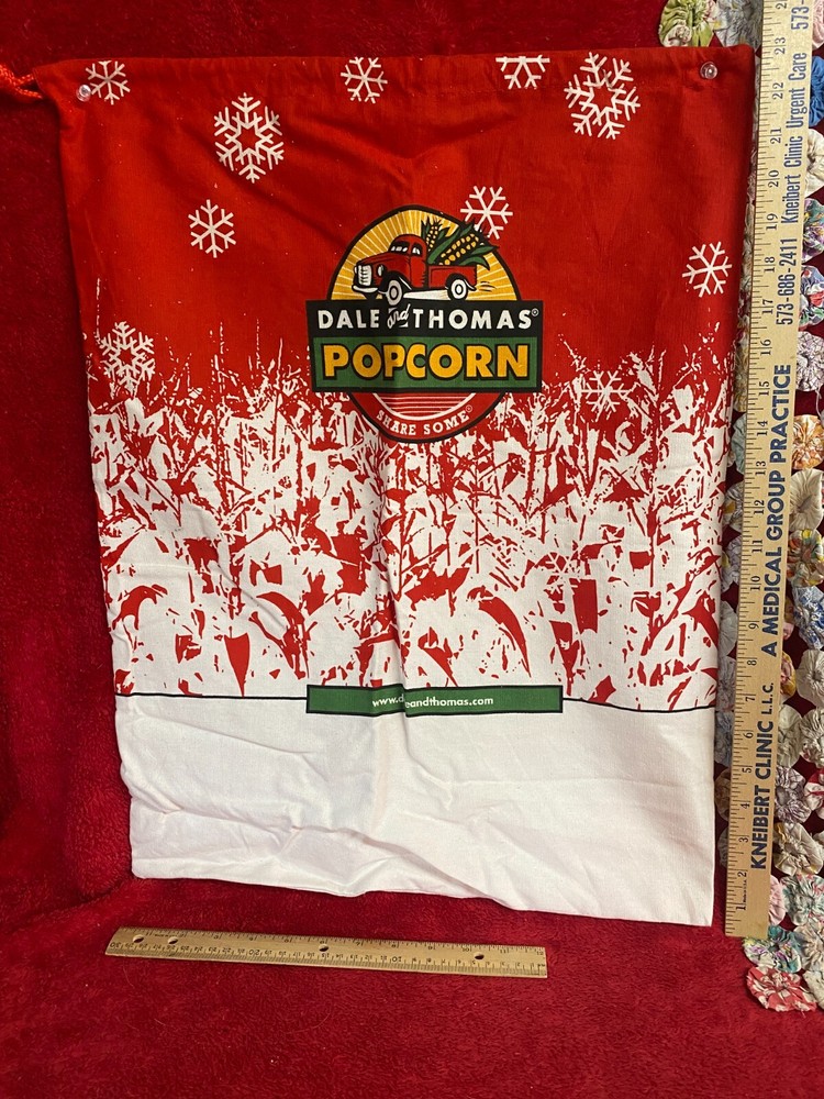 Drawstring Dave & Thomas Popcorn Cotton Bag Snowflake on Red Background