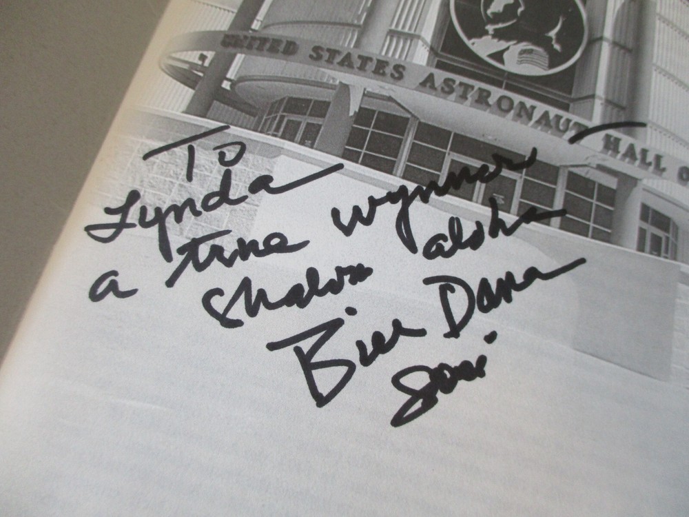 NASA APOLLO ASTRONAUT INDUCTION PROGRAM SIGNED BY WALTER M. SCHIRRA + PEN