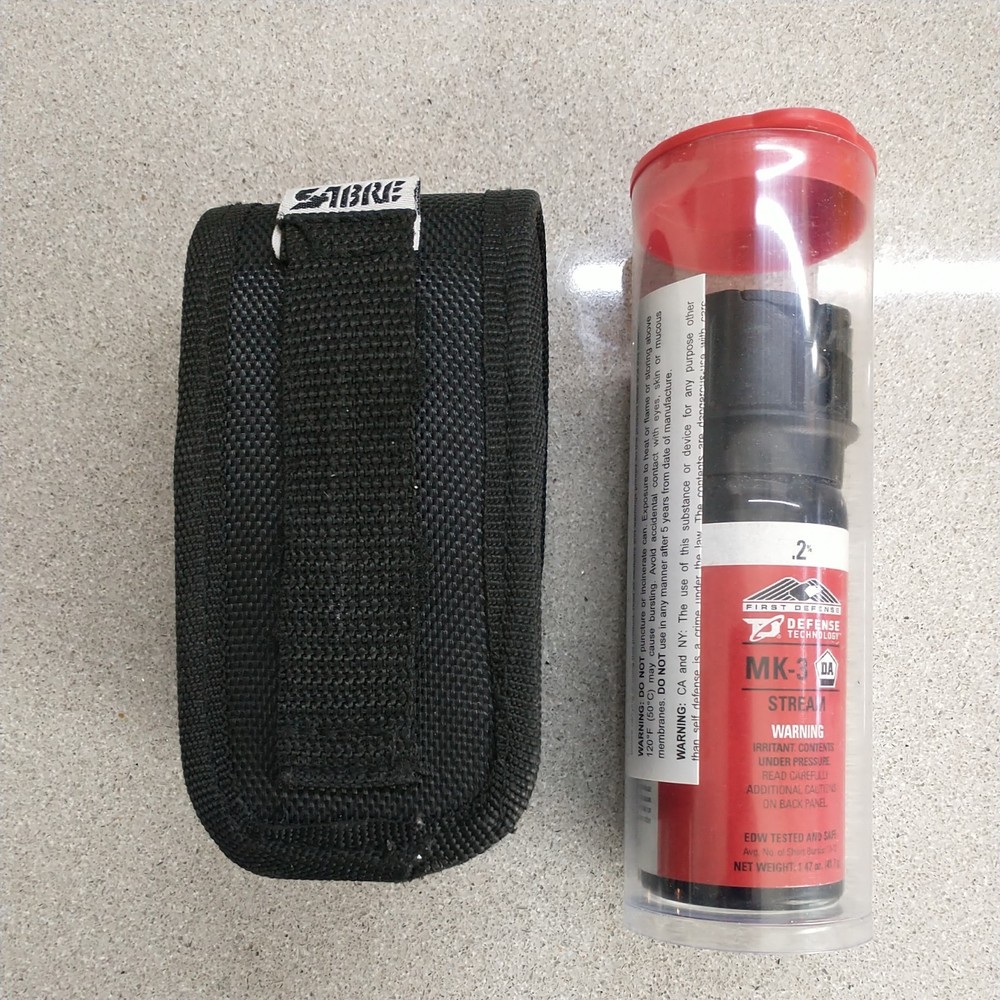 One (1) Defense Technology OC Stream MK-3 .2% Solution w/ Ballistic Nylon Holder