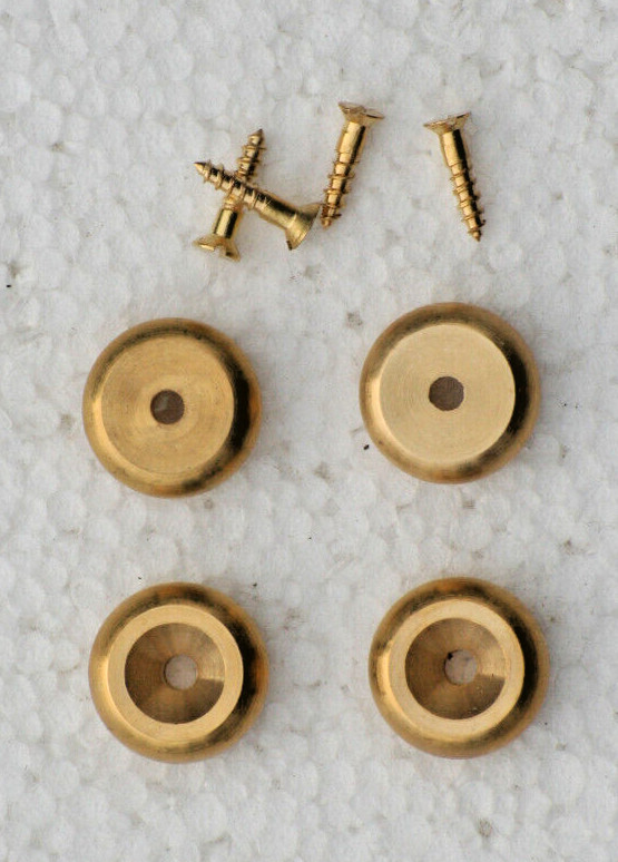 A SET OF 4 STYLISH CAST BRASS BUN STYLE CLOCK FEET.