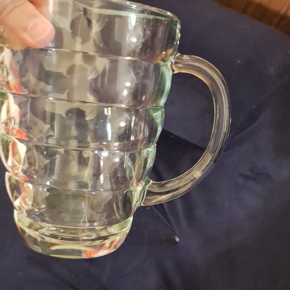 Clear Glass Pitcher Ribbed Design Round Shape Glossy Finish Solid Pattern Handle