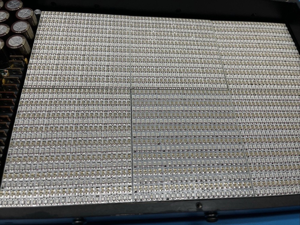 Electronic Chips Inside Testing Light Box For Perhaps Plastic Bottles Integrity.