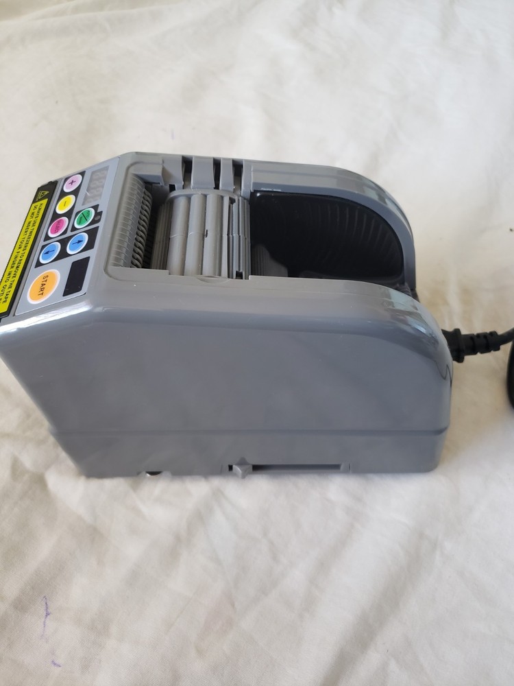 RT-7000 AUTOMATIC TAPE CUTTING MACHINE