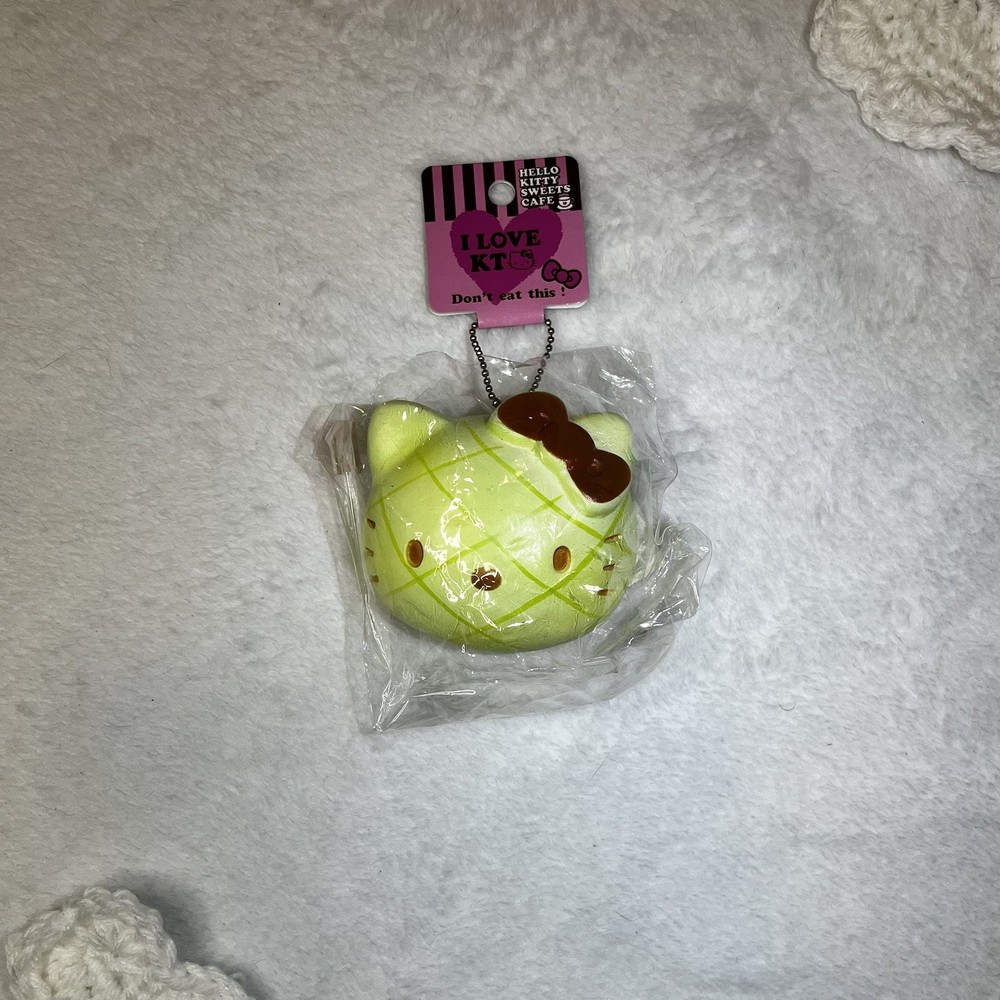 RARE Authentic 2009 Hello Kitty Melon Bread Head Bun Squishy