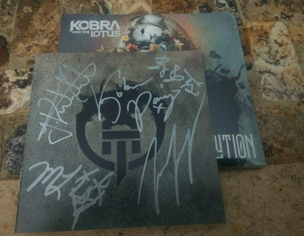 Autographed KOBRA AND THE LOTUS signed cd Evolution