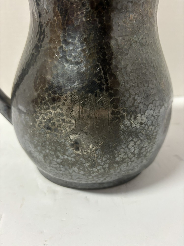 Silver antiqued distressed pitcher