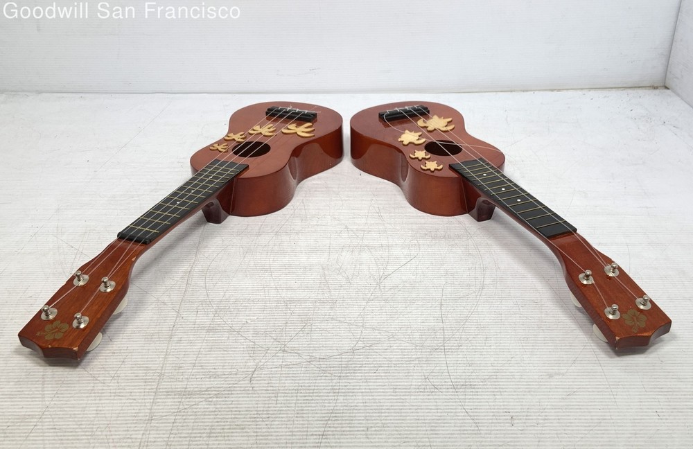 2 Universal Worldwide Trading Inc 4-String Soprano Ukuleles