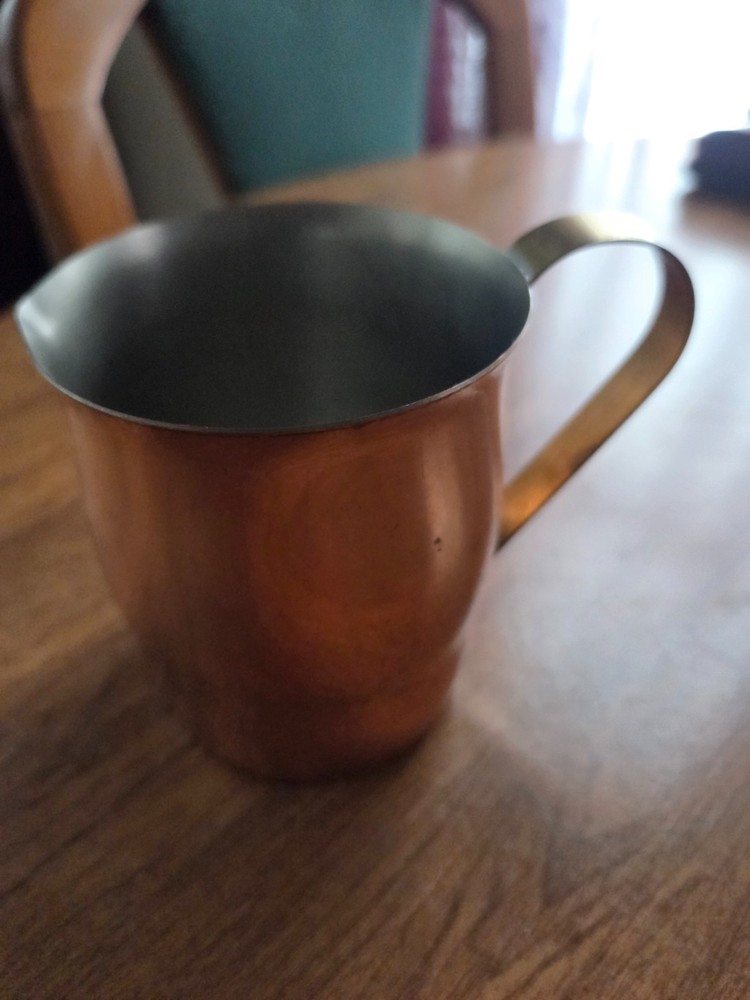 Copper pitcher with handle 3.75" high in very good condition
