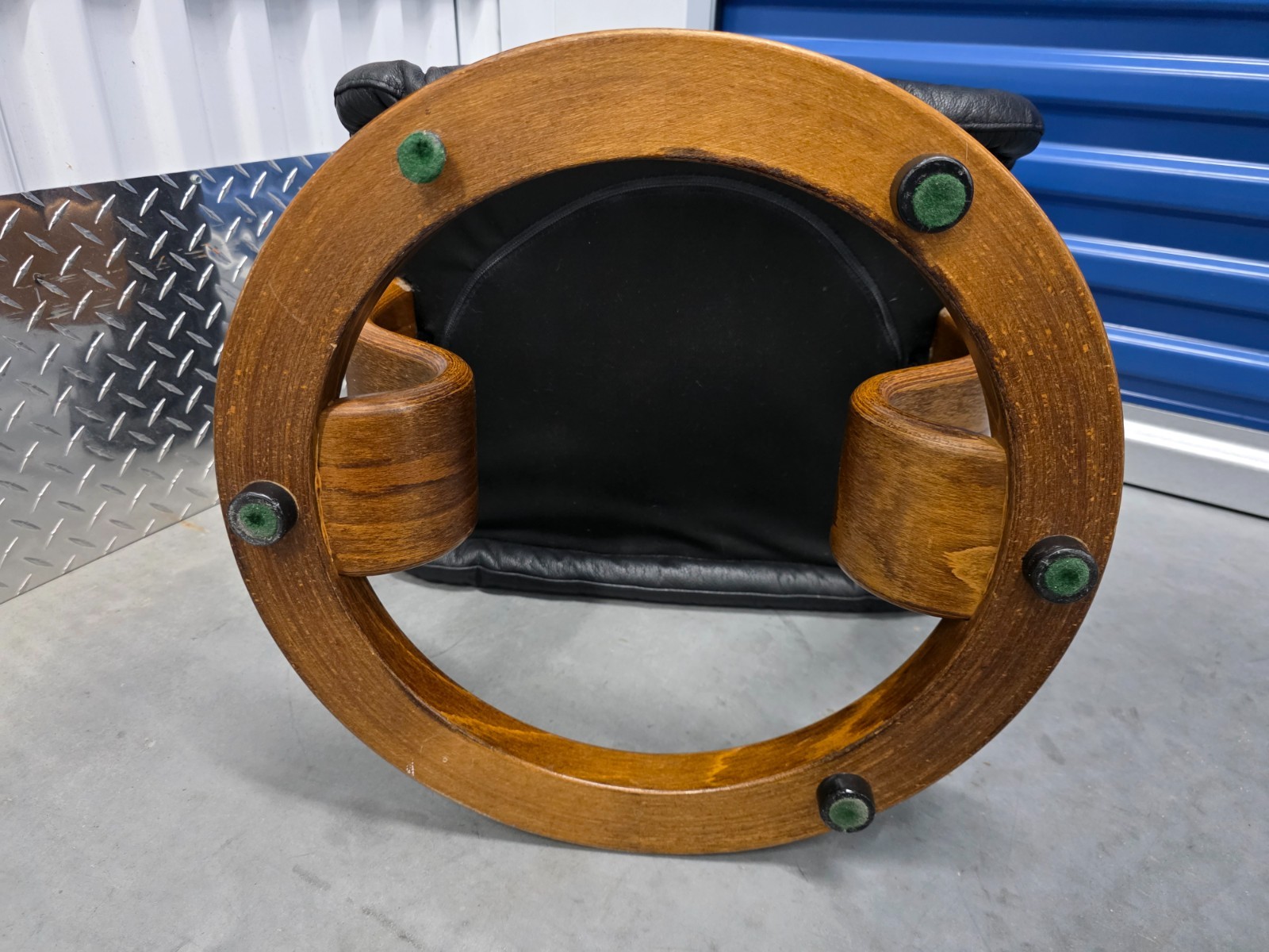 Ekornes Stressless Black Colored Leather Ottoman | Teak Stained Wood Base