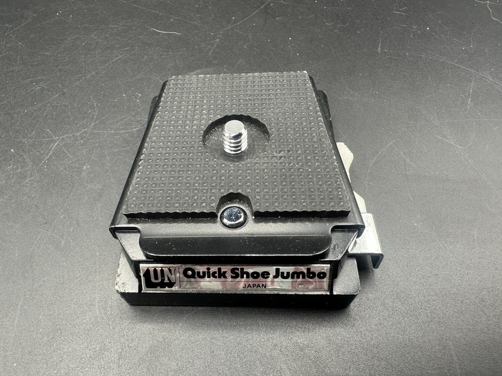 UN Camera Quick Shoe Jumbo.         LP
