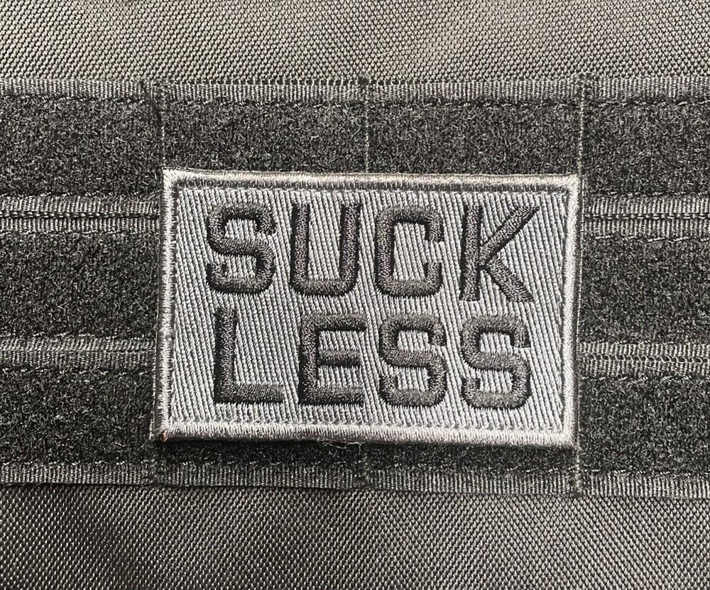 Suck Less Funny Tactical Warfighter Morale Patch Hook Loop Gray Navy