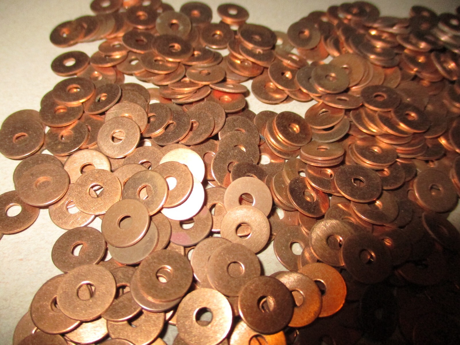 125 NEW-OLD-STOCK #14 COPPER BURRS, 11/32" WIDE & .093 CENTER HOLE, NAUTICAL
