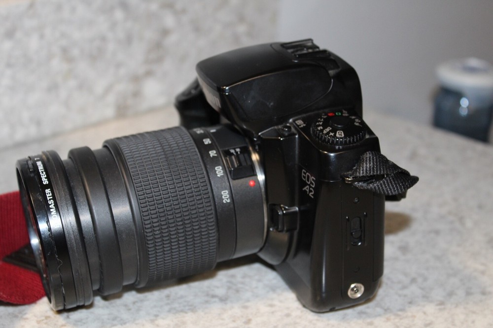 Canon EOSA2 Camera With- 72mm Promaster Lens W/ Strap & Case Bundle