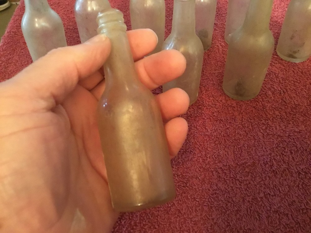 9 Miniature Wiskey Bottles