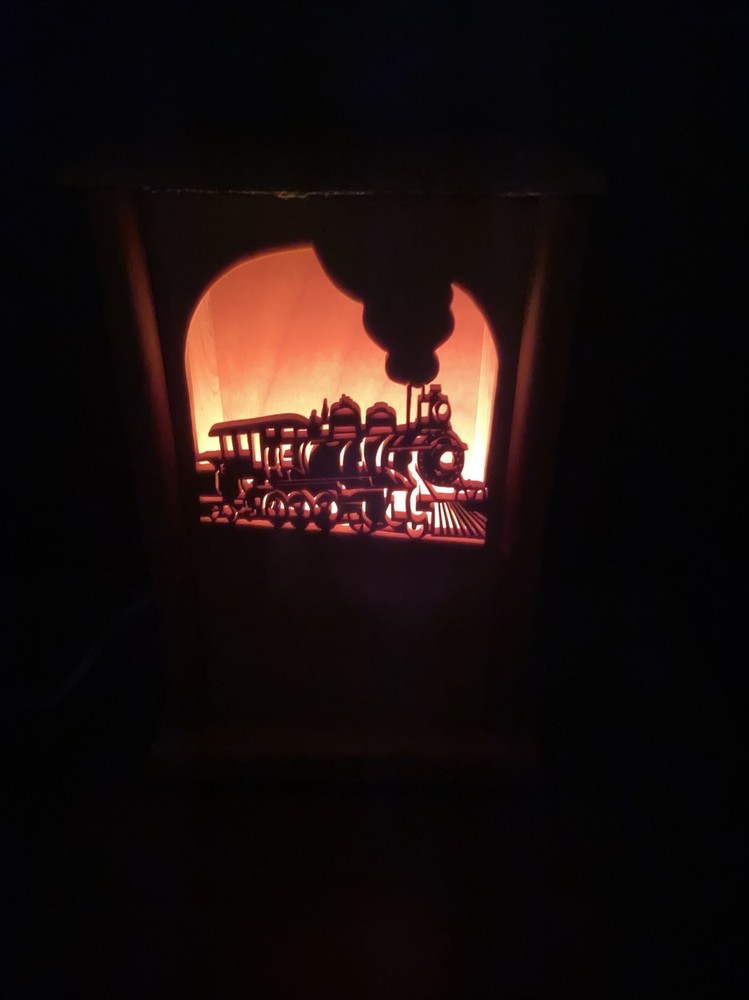 Unique  Hand crafted Wooden Light With Four Changeable Panels