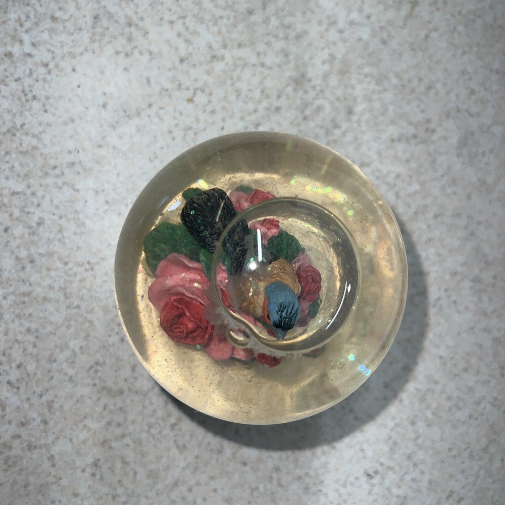 Vintage bird snow globe