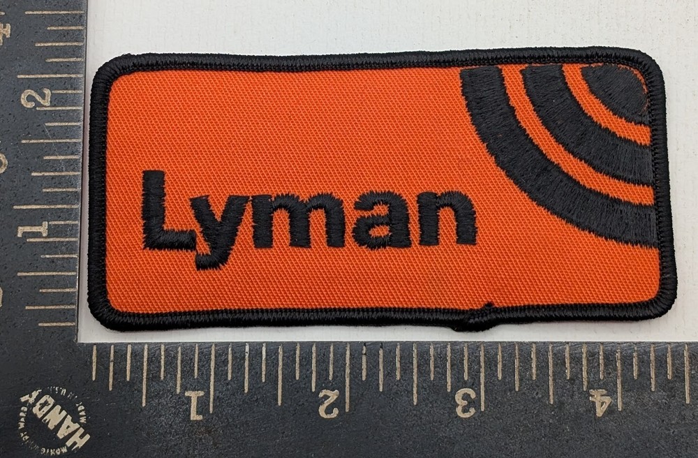 Lyman Reloading Equipment Patch Orange Black Firearms Ammunition Badge