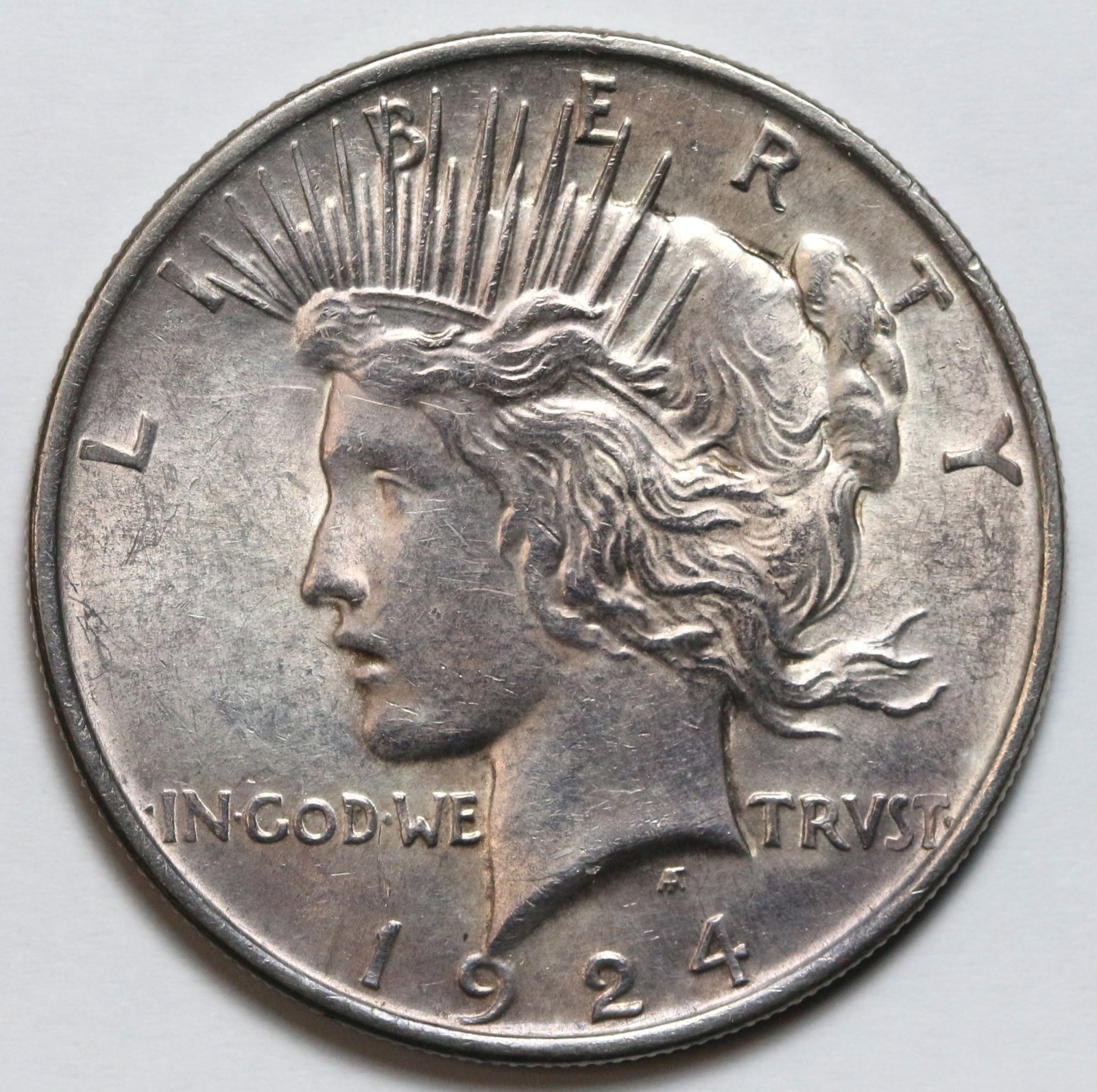 1924 $1 Peace Silver Dollar - RAW - Great Luster / Toned