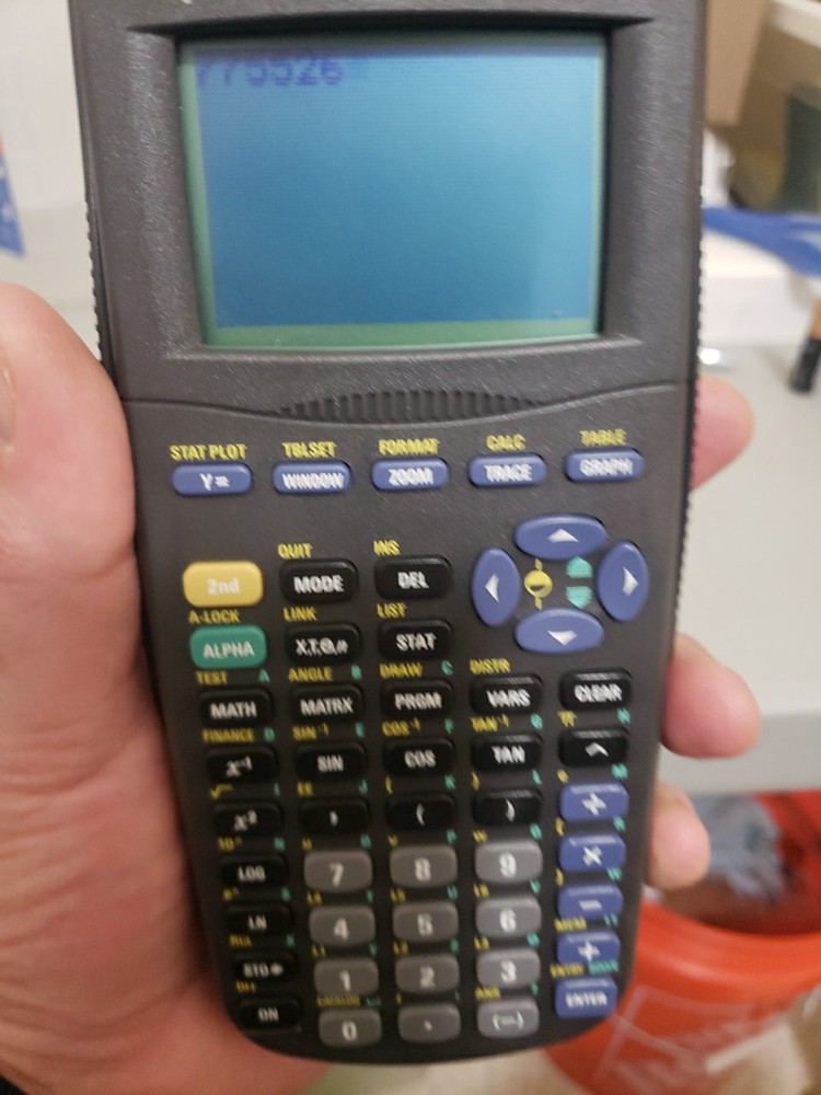 Texas Instruments TI-83 Handheld Graphing Calculator