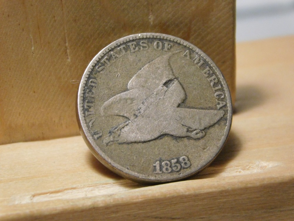 1858 Flying Eagle cent error, lamination across the center