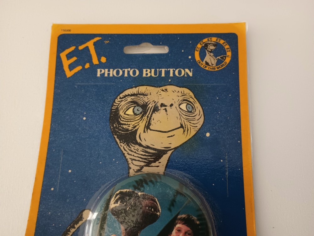 1982 E. T. Photo Button New in Package & Mechanical E.T. Plastic Figure
