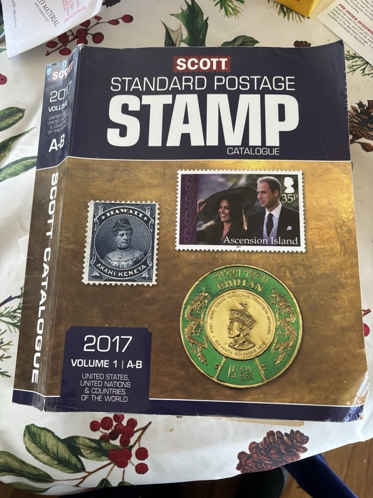 2017 SCOTT TAMP CATALOG VOLUME 1. ONE LOOSE PAGE. SEE PIC