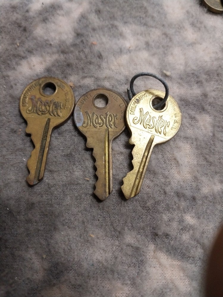 3 old master lock keys