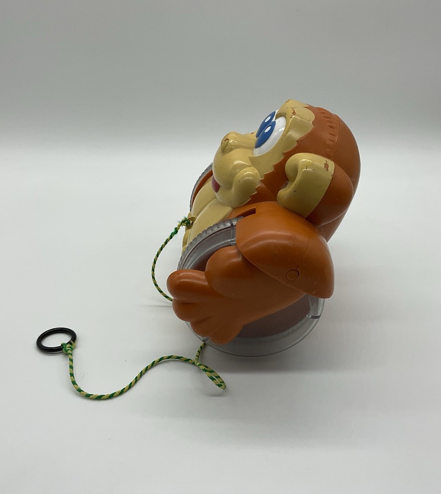 Vintage 1980s Pull Along Monkey Toy Rolling