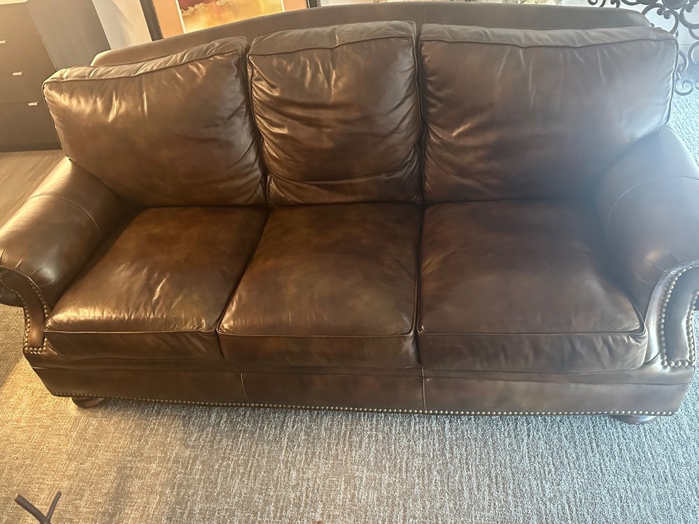 Gently Used Brown Leather Sofa