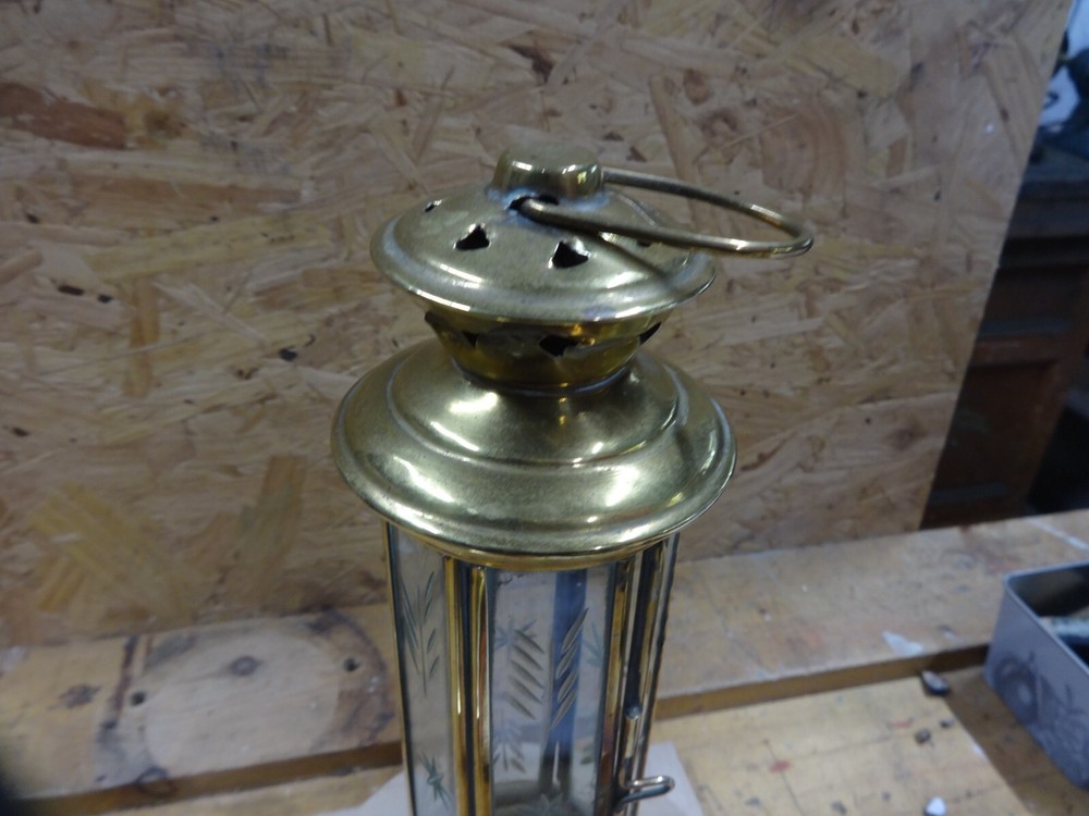 A Brass Candle Lamp.