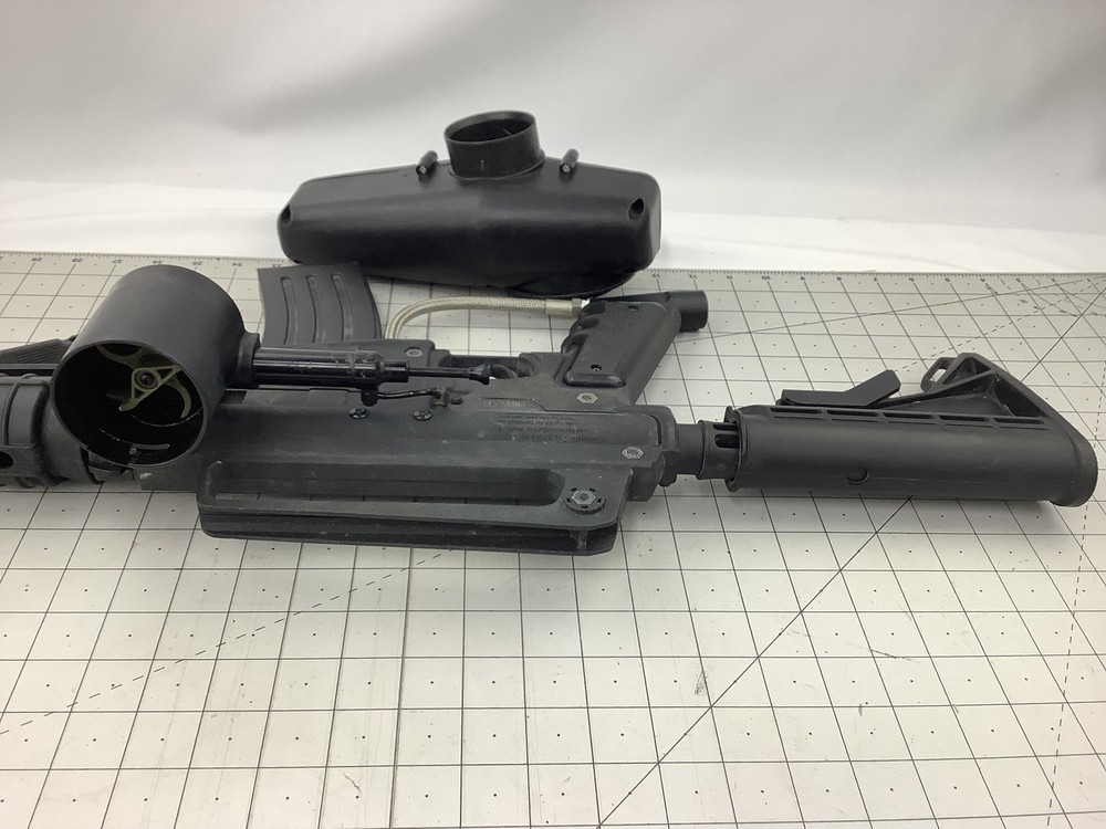 Tippmann Alpha black paintball marker with e trigger and cyclone feed untested