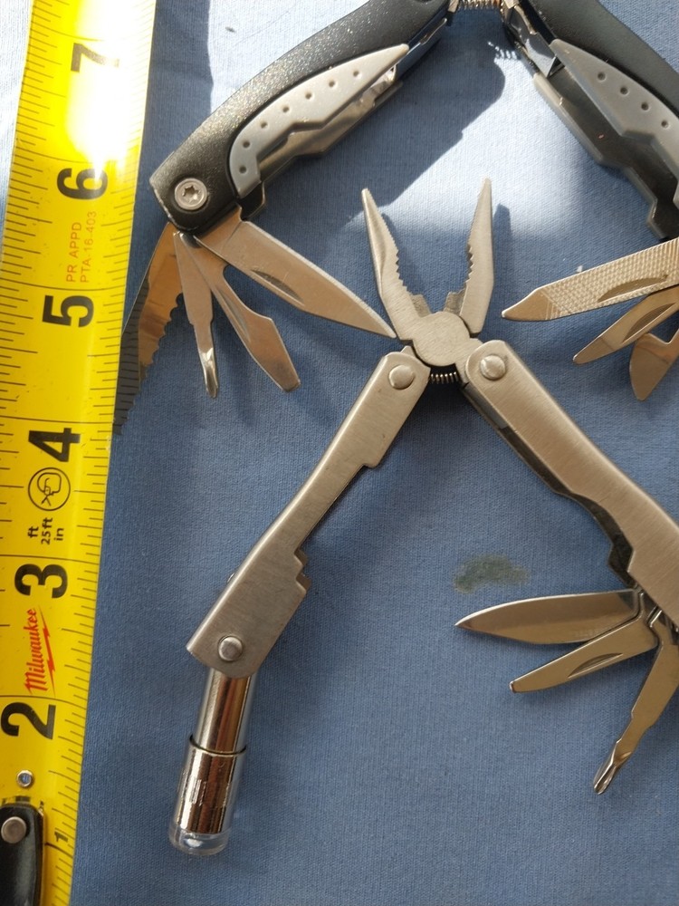 4 small multitudes with pliers knife scissors screwdriver's